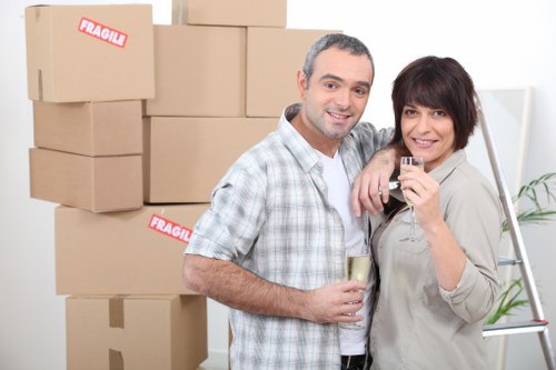 Professional movers handling office furniture in Leavesgreen